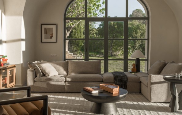 Two Tastes, One Living Room: The Nube Sectional Sofa in a French Chateau