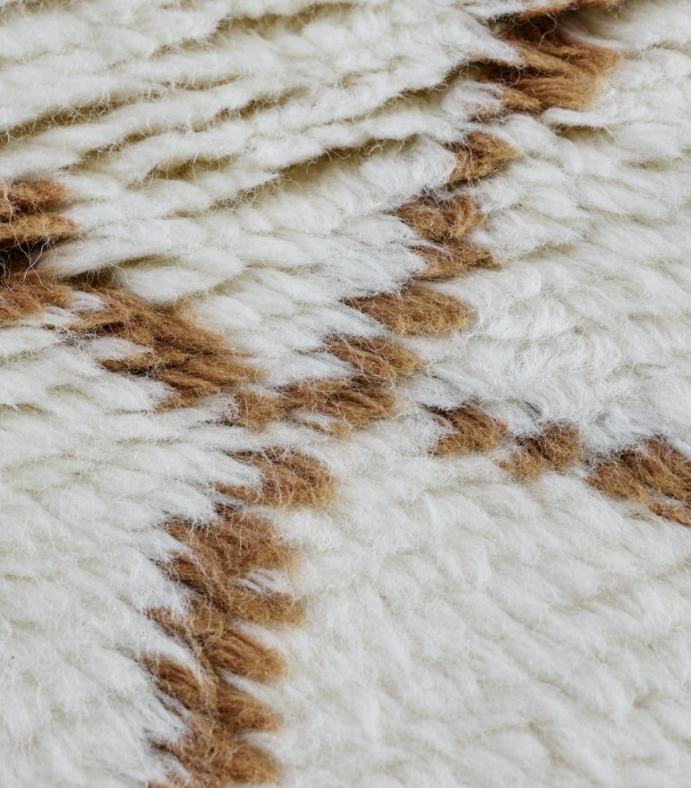 Three New <br>Hand-Knotted Rugs