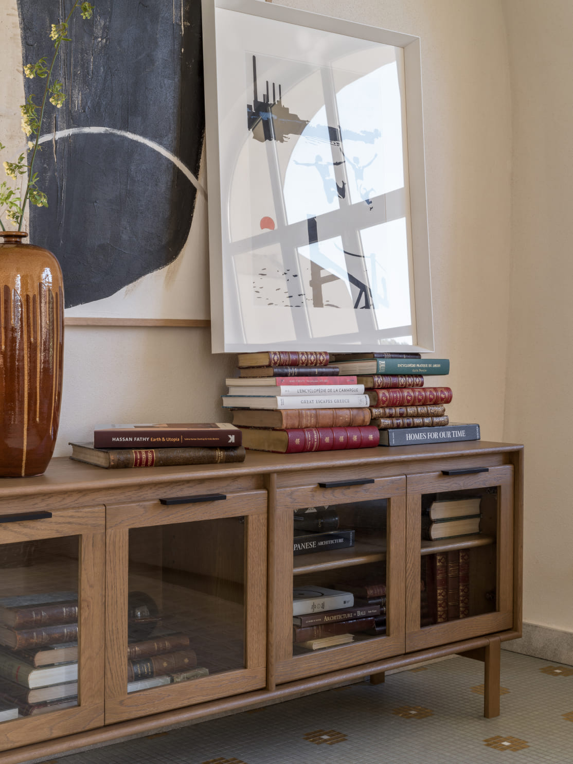 Stacked books, an improvised pedestal